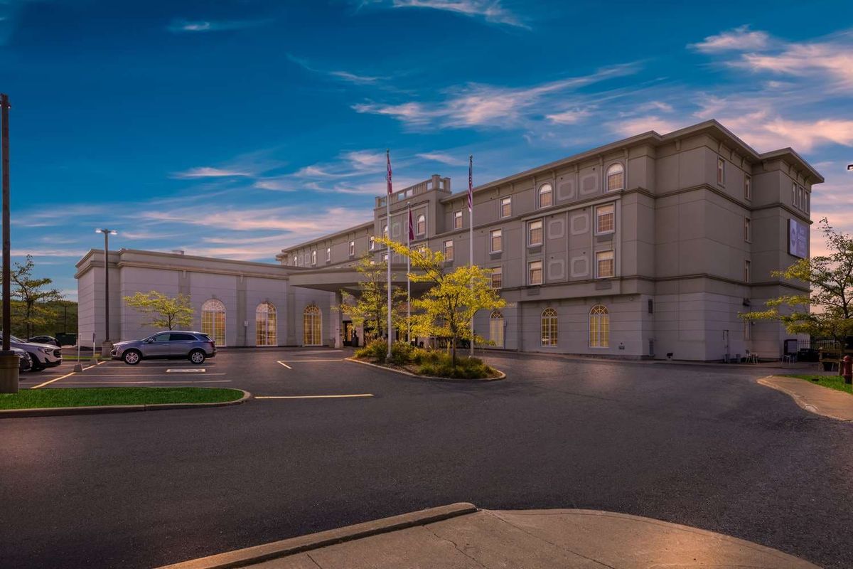 Exterior of Best Western Plus Orangeville Inn & Suites at dusk
