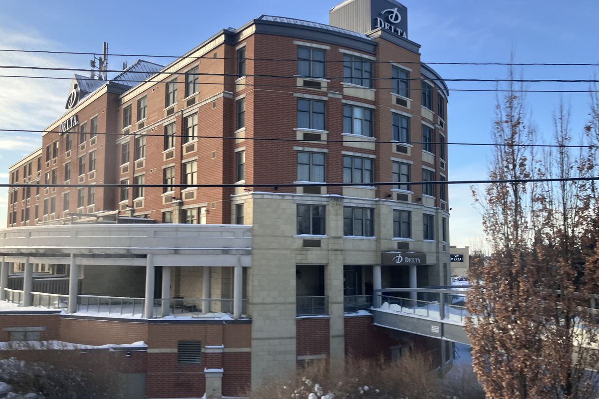 Exterior of Delta Hotels by Marriott Guelph, a red-brick hotel on Stone Road West in Guelph