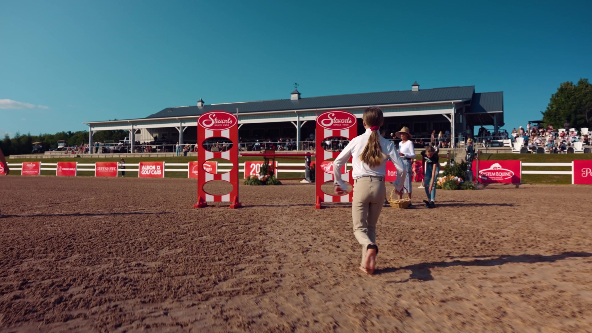 Girl running the course in the horseless horse show at Caledon Equestrian Park