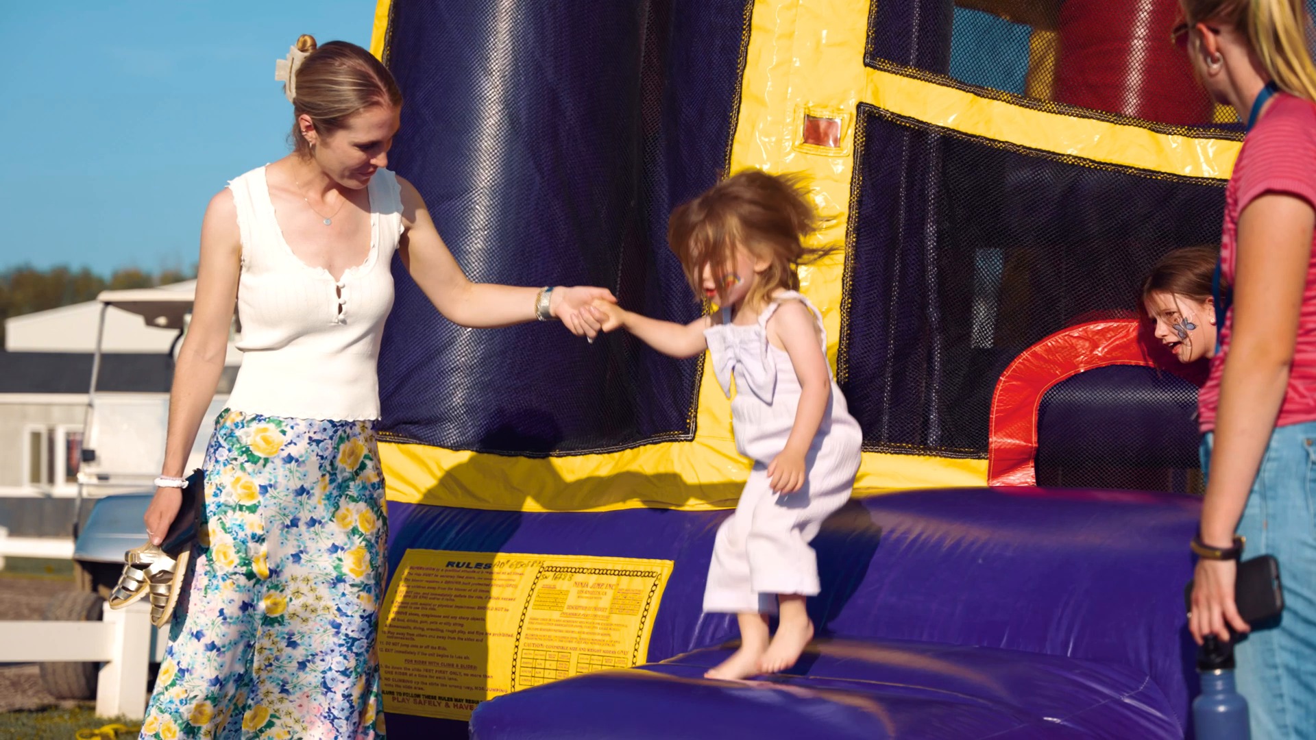 Little girl on the bouncy castle at a Caledon Super Saturday