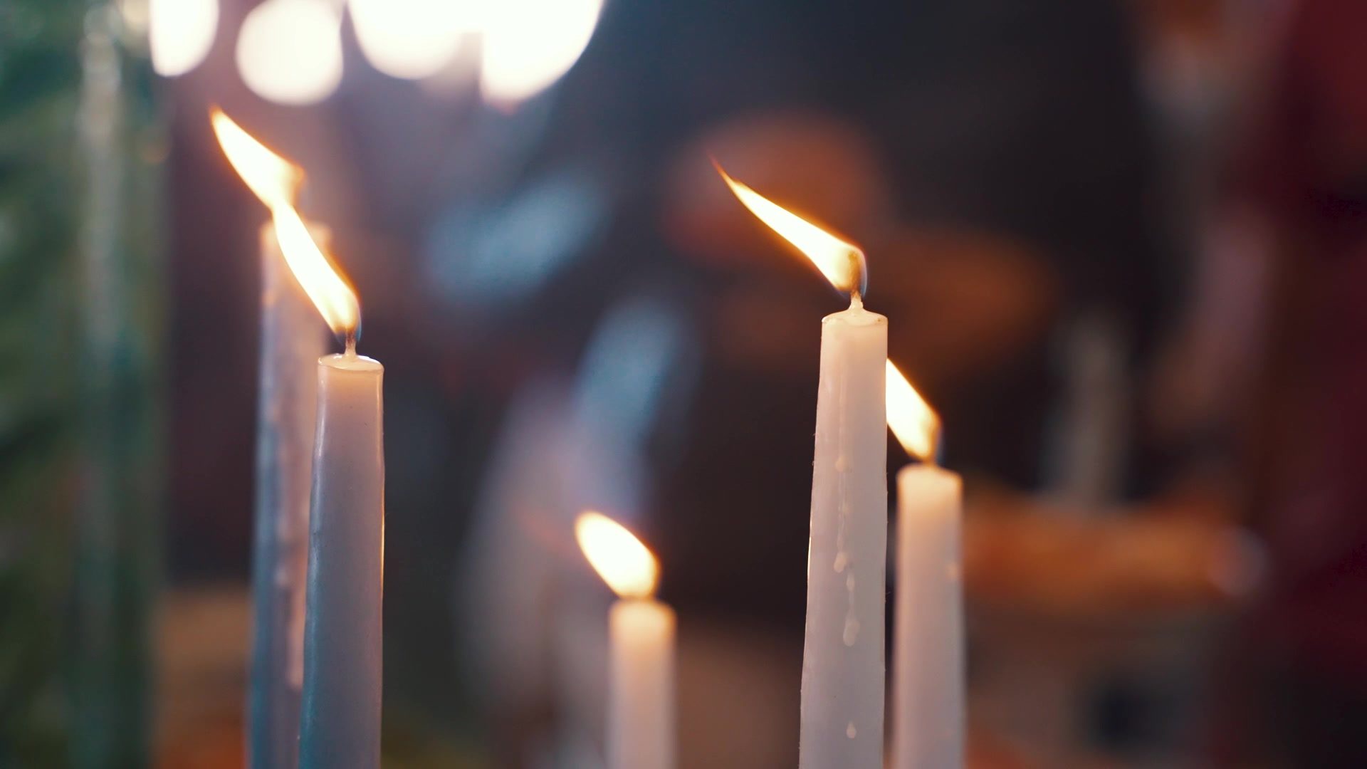 Candlelight on the tables in the hospitality tent