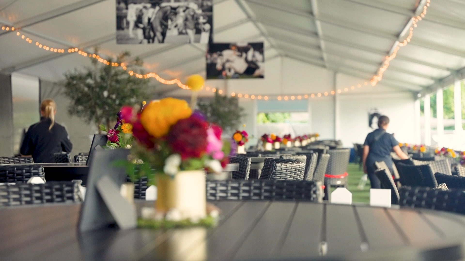 Florals and table settings in the hospitality tent